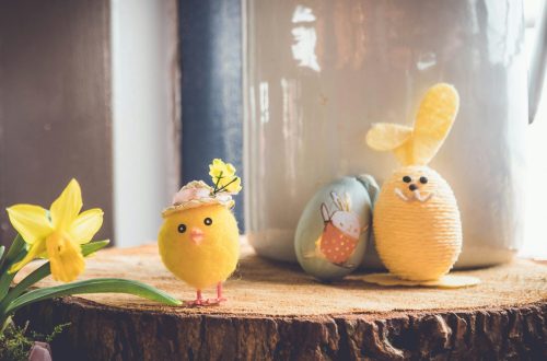 Easter-themed photo with Easter eggs and a stuffed chick.